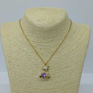 Stainless steel necklace with pendant , New with tags , Color gold and purple